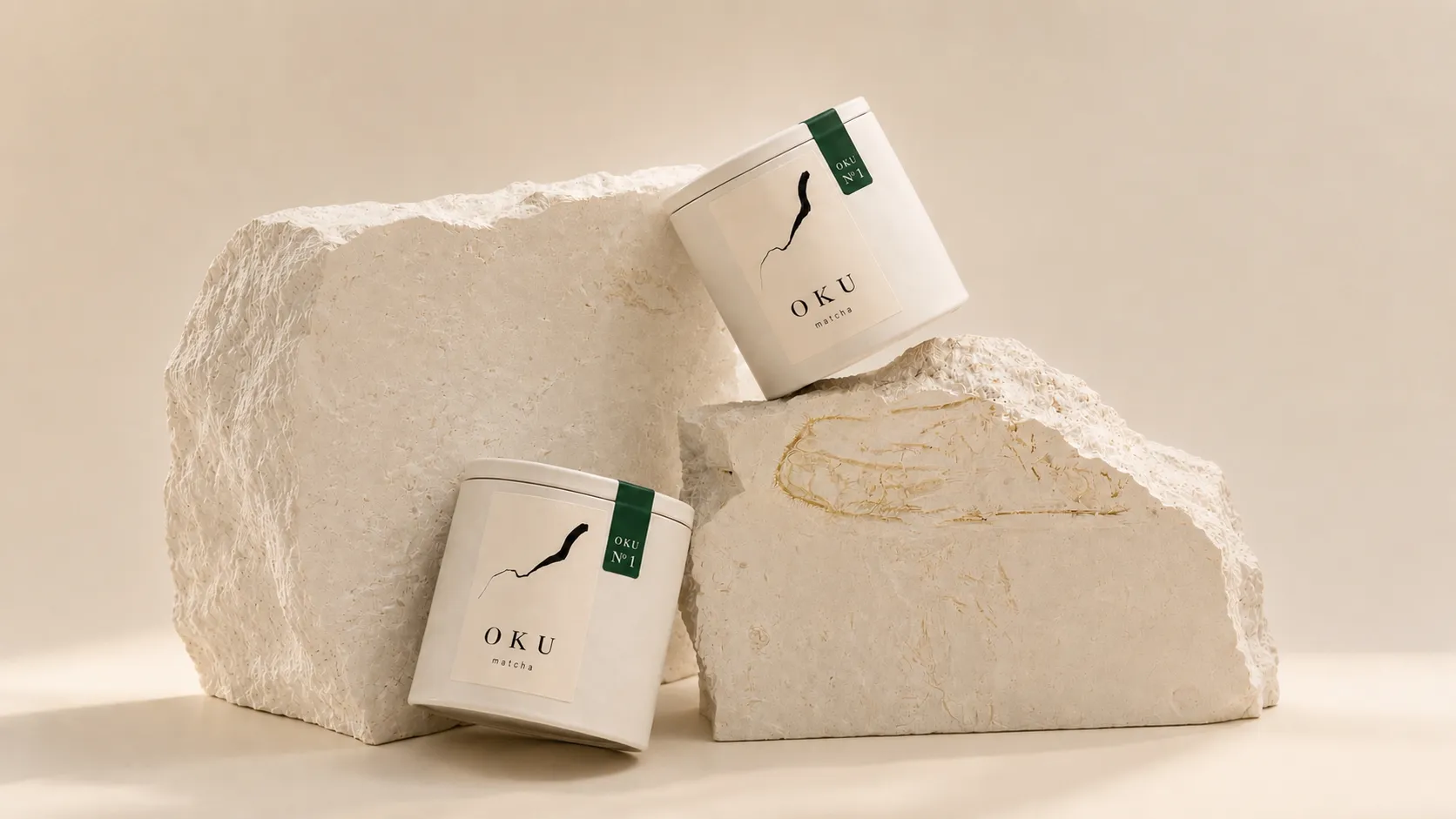 An Oku matcha tin on a pale paper background.