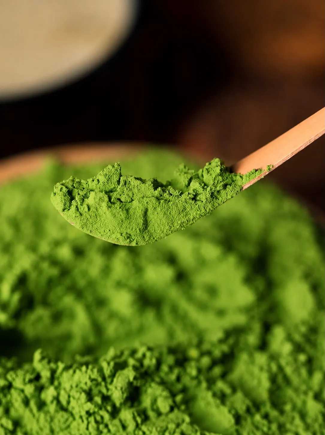 Bright green matcha powder, close up.